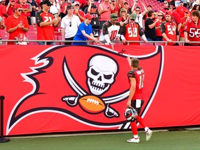 Adam Humphries of the Tampa Bay Buccaneers throws his gloves to a fan after a 34-32 loss to the Atlanta Falcons at Raymond James Stadium on Dec. 30, 2018 in Tampa, Florida. (Julio Aguilar/Getty Images)