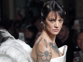 Actress Asia Argento walks the runway during the Antonio Grimaldi Spring Summer 2019 show as part of Paris Fashion Week on Jan. 21, 2019 in Paris. (Thierry Chesnot/Getty Images)