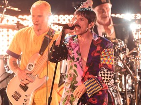 Flea, left, and Anthony Kiedis of Red Hot Chili Peppers perform onstage during the 61st Annual GRAMMY Awards at Staples Center on February 10, 2019 in Los Angeles, California.  (Photo by Kevin Winter/Getty Images for The Recording Academy)