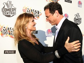 Lori Loughlin and Bob Saget arrive to "Comedy Central Roast of Bob Saget" at the Warners Brothers Studio Lot on August 3, 2008 in Burbank, Calif.  (Alberto E. Rodriguez/Getty Images for Comedy Central)