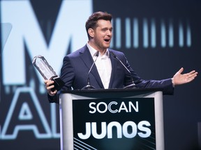 Michael Buble accepts the Adult Contemporary Album of the Year at the Juno Gala Dinner and Awards in London, Ontario, Saturday, March 16, 2019.