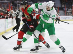 Ottawa Senators defenceman Ben Harpur and Toronto Maple Leafs centre Auston Matthews battle during first period NHL action in Ottawa on Saturday, March 16, 2019.