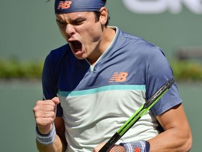 Milos Raonic celebrates winning a point against Miomir Kecmanovic at the BNP Paribas Open in Indian Wells, Calif., on Thursday, March 14, 2019.