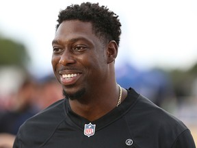 In this July 18, 2018, file photo, Oakland Raiders NFL football tight end Jared Cook gives a television interview in Chiswick, west London.