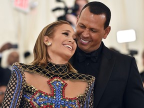 Jennifer Lopez and Alex Rodriguez arrive for the 2018 Met Gala on May 7, 2018, at the Metropolitan Museum of Art in New York. (HECTOR RETAMAL/AFP/Getty Images)