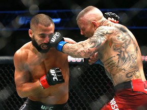 John Makdessi, left, fights Ross Pearson during UFC Fight Night at the Saddledome in Calgary on Saturday, July 28, 2018 in a preliminary match. (Jim Wells/Postmedia Network)