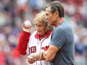 Julia Ruth Stevens, the daughter of Babe Ruth, throws out a ceremonial first pitch before a game between the Tampa Bay Rays and Boston Red Sox on July 9, 2016 at Fenway Park in Boston.
