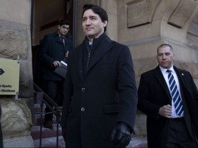 Prime Minister Justin Trudeau walks to the National Press Theatre in Ottawa to deliver remarks on Thursday, March 7, 2019.