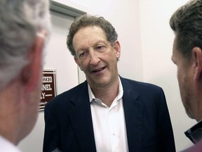 In This Oct. 5, 2015 file photo, San Francisco Giants president and CEO Larry Baer speaks to reporters after a news conference in San Francisco.