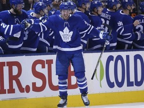 Maple Leafs forward Frederik Gauthier is congratulated after scoring during NHL action in Toronto on Feb. 25, 2019.