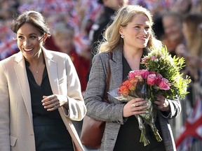 Meghan, Duchess of Sussex makes an official visit to Sussex with her assistant Amy Pickerill on Oct. 3, 2018 in Chichester, U.K. (Photo by /Getty Images)