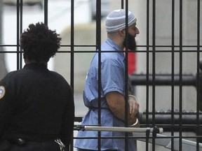 In this Feb. 3, 2016 file photo, Adnan Syed enters Courthouse East in Baltimore prior to a hearing.