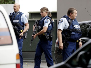Armed police patrol outside a mosque in central Christchurch, New Zealand, Friday, March 15, 2019.