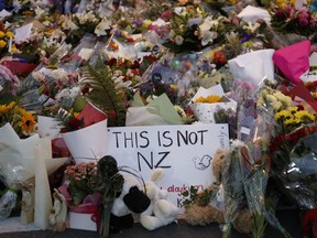 In this Saturday, March 16, 2019, file photo, flowers lay at a memorial near the Masjid Al Noor mosque for victims in last week's shooting in Christchurch, New Zealand.