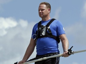 In this June 18, 2013 file photo, high wire performer Nik Wallenda practices in Sarasota, Fla.