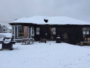 The charred remains of the home where five-year-old Quinn Butt on April 24, 2016, is seen in this Dec. 9, 2016, handout photo. (THE CANADIAN PRESS/HO-Facebook-Trent Butt)