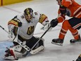 Edmonton Oilers Ty Rattie (8) can't jam the puck past Vegas Golden Knights goalie Marc-Andre Fleury (29) during NHL action at Rogers Place in Edmonton, December 1, 2018.