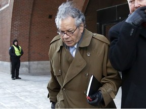 In this Jan. 30, 2019, file photo, Insys Therapeutics founder John Kapoor leaves federal court in Boston. Kapoor and four other former company executives are accused of scheming to bribe doctors into prescribing a powerful fentanyl painkiller.
