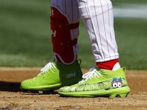 The cleats of Philadelphia Phillies' Bryce Harper are seen during opening day against the Atlanta Braves, Thursday, March 28, 2019, in Philadelphia.