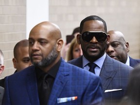 Musician R. Kelly arrives at the Daley Center for a hearing in his child support case at the Daley Center, Wednesday, March 6, 2019, in Chicago.