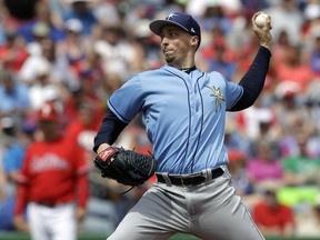 In this Monday, March 11, 2019, file photo, Tampa Bay Rays' Blake Snell pitches to the Philadelphia Phillies in Clearwater, Fla.