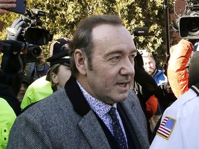 In this Jan. 7, 2019 file photo, actor Kevin Spacey departs from district court after arraignment on a charge of indecent assault and battery in Nantucket, Mass.