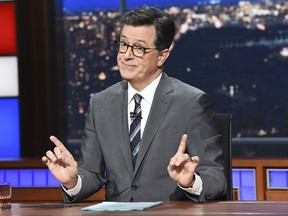 This Nov. 6, 2018 photo released by CBS shows host Stephen Colbert on the set of "The Late Show with Stephen Colbert" in New York. (Scott Kowalchyk/CBS via AP)