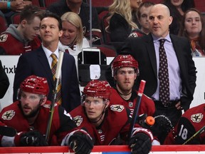 Head coach Rick Tocchet of the Arizona Coyotes watches from the bench during the third period of the NHL game against the Calgary Flames at Gila River Arena on March 07, 2019 in Glendale, Arizona.