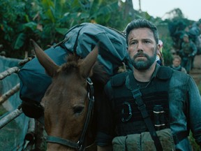 This image released by Netflix shows Ben Affleck in a scene from the film, "Triple Frontier." (Netflix via AP)
