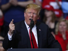 U.S. President Donald Trump speaks during a rally in Grand Rapids, Mich., Thursday, March 28, 2019.