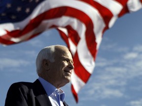 In this Nov. 3, 208 file photo, Republican presidential candidate Sen. John McCain, R-Ariz. speaks at a rally outside Raymond James Stadium in Tampa, Fla.