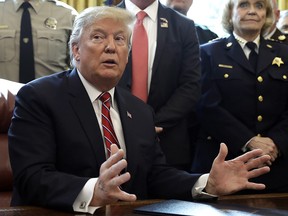 President Donald Trump speaks about border security in the Oval Office of the White House, Friday, March 15, 2019, in Washington. (AP Photo/Evan Vucci)