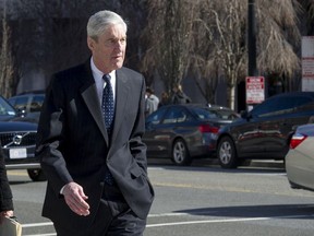 Special Counsel Robert Mueller walks to his car after attending services at St. John's Episcopal Church, across from the White House, in Washington, Sunday, March 24, 2019.