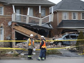 Homes severely damaged in Scarborough on Grackle Trail after an early morning TTC bus crash Thursday March 21, 2019. Jack Boland/Toronto Sun