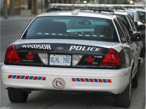 Windsor Police cruisers outside of headquarters.