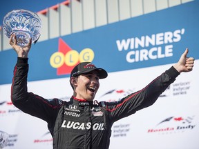 In this July 15, 2018, file photo, Canada's Robert Wickens celebrates after finishing third in an IndyCar race in Toronto. (Tijana Martin/The Canadian Press via AP, File)