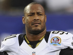 In this Dec. 9, 2012, file photo, New Orleans Saints defensive end Will Smith appears before a game against the New York Giants in East Rutherford, N.J. (AP Photo/Bill Kostroun, File)