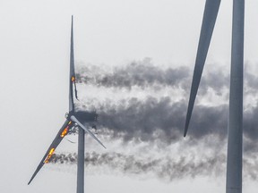 A towering wind turbine went up in flames Friday, March 15, 2019 at a wind farm located at the edge of West Pubnico, a southern Nova Scotia community. (THE CANADIAN PRESS/HO-Frankie Crowell)
