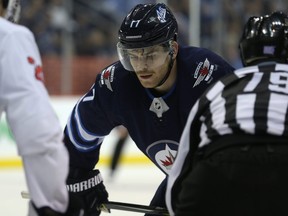 Jets centre Adam Lowry is facing a possible fine or suspension after delivering a high stick to the head of Nashville's Filip Forsberg in Friday's heated game in Winnipeg.