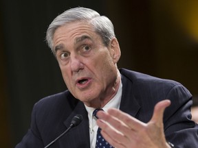 In this June 19, 2013, file photo, Federal Bureau of Investigation Director Robert Mueller testifies before the Senate Judiciary Committee, on Capitol Hill in Washington.