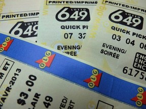 Lotto 649 tickets are shown in Toronto in on December 2, 2013.
