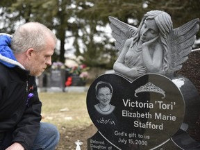 Rodney Stafford, father to Tori Stafford, visits her grave shortly before the 10th anniversary of her death. Stafford is organizing a Parliament Hill rally to fight for justice reform, inspired by his daughter. (Kathleen Saylors/Postmedia News)