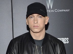 In this July 20, 2015, file photo, rapper Eminem attends the premiere of "Southpaw" in New York. Eminem released his new album "Kamikaze" on Friday, Aug. 31, 2018.