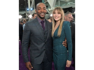 LOS ANGELES, CA - APRIL 22:  (L-R) Anthony Mackie and Elizabeth Olsen attend the Los Angeles World Premiere of Marvel Studios' "Avengers: Endgame" at the Los Angeles Convention Center on April 23, 2019 in Los Angeles, California.
