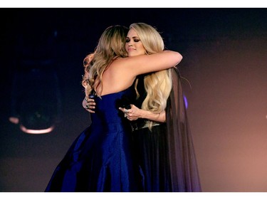 (L-R) Lauren Alaina and Carrie Underwood perform onstage during the 54th Academy Of Country Music Awards at MGM Grand Garden Arena on April 7, 2019 in Las Vegas.