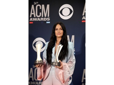 Female Artist of the Year winner Kacey Musgraves poses in the press room during the 54th Academy Of Country Music Awards at MGM Grand Hotel & Casino on April 7, 2019 in Las Vegas