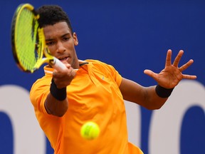 Felix Auger-Aliassime of Canada plays a forehand hand against Kei Nishikori of Japan during the round of 16 match on day two of the Barcelona Open Banc Sabadell at Real Club De Tenis Barcelona on April 25, 2019 in Barcelona. (David Ramos/Getty Images)