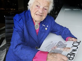 Former Mississauga mayor Hazel McCallion with a copy of Zoomer magazine which features her on the front cover. (Veronica Henri, Toronto Sun)