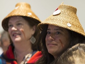 Former justice minister Jody Wilson-Raybould and former treasury board president Jane Philpott are seen as they take part in a ceremony at the First Nations Justice Council in Richmond, B.C, on April 24, 2019.
