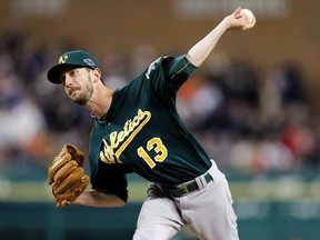 Jerry Blevins of the Oakland Athletics throws a pitch against the Detroit Tigers uring Game One of the American League Division Series at Comerica Park on October 6, 2012 in Detroit, Michigan.